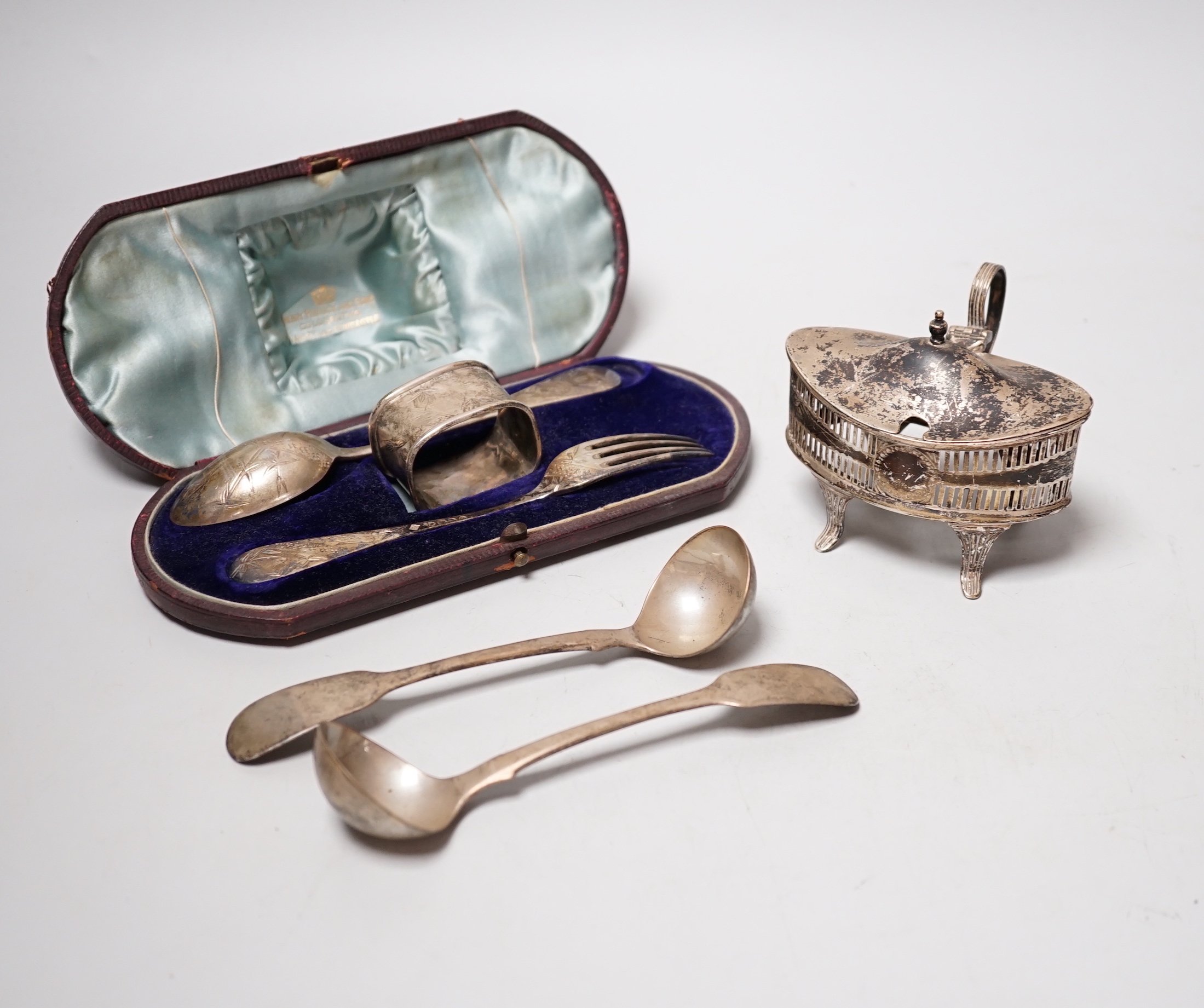 A cased Victorian silver christening trio, Martin, Hall & Co, London & Sheffield, 1881, a pair of William IV silver fiddle pattern sauce ladles, London, 1836 and a late silver mustard, lacking liner.